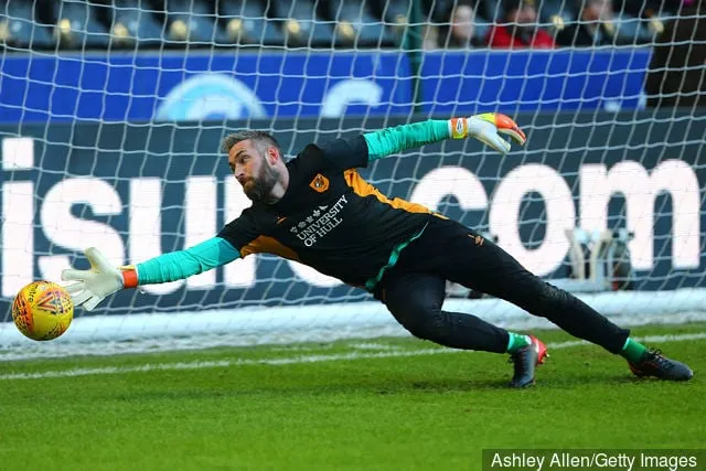 Allan McGregor-doelman van Hull City tijdens de warming-up voorafgaand aan het spel tijdens de Sky Bet Championship-wedstrijd tussen Hull City en Derby County in het KCOM Stadium op 26 december...' title='Fans van Hull City reageren op de naar verluidt aanstaande terugkeer van de Rangers van Allan McGregor