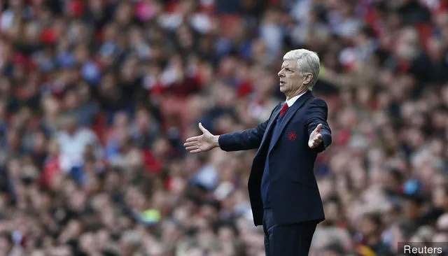 L'allenatore dell'Arsenal Arsène Wenger' title='Robert Pires ha un piccolo rammarico per il trasferimento dell'Arsenal